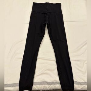 Athleta leggings with flower pattern on lower leg